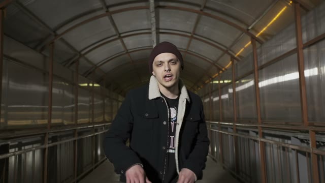 Guy Moves His Hands And Reads