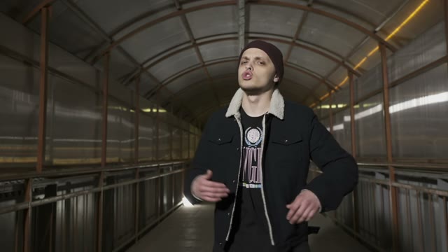Rapper Reads Rap And Man Walks