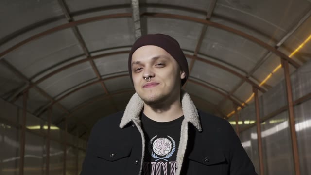 Rapper Looks Camera And Smiles