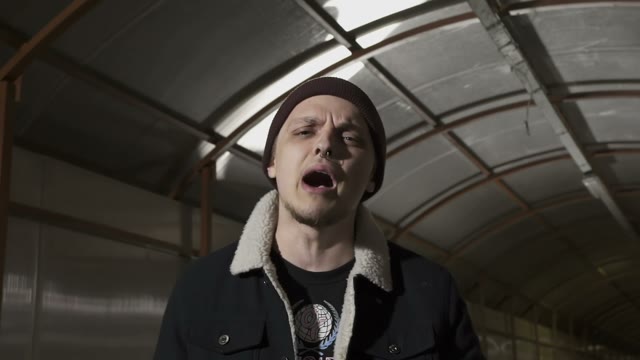 Rapper Walks And Reads Rap