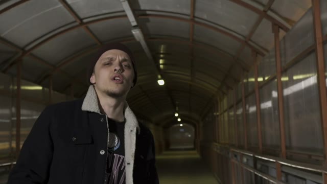 Guy Reads Rap And Walks