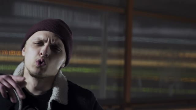 Guy Rapping And Looking Camera