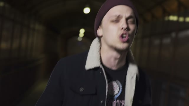Guy Hat Reading Rap
