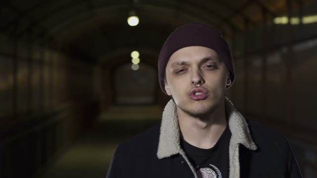 Guy Looks Camera And Sings