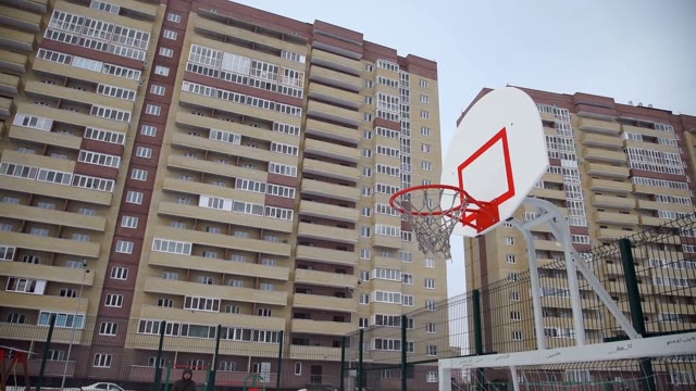 Basketball Ring Hanging In The Yard