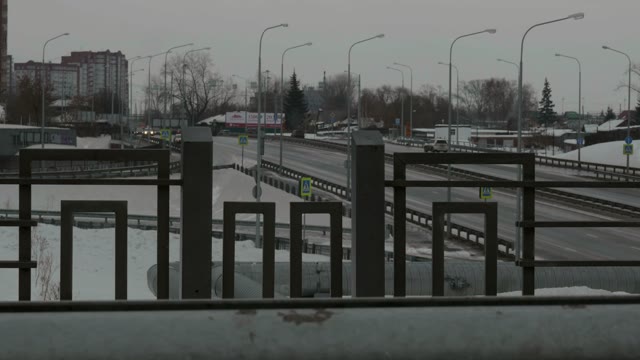 Cars Turn And Rise On The Bridge