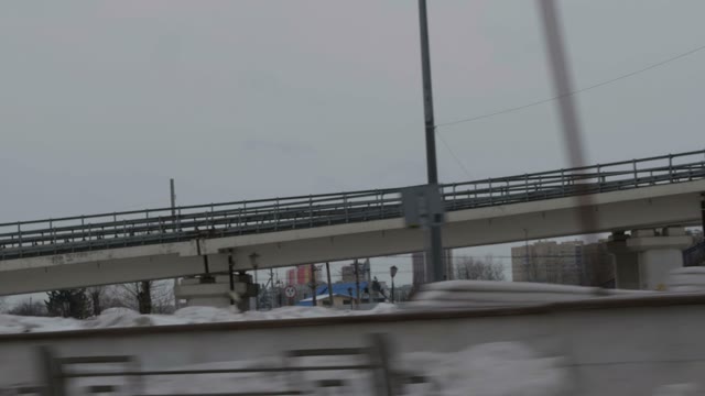Dirty Snow Under Bridge