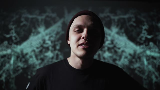 Guy Reads Rap And Smiles