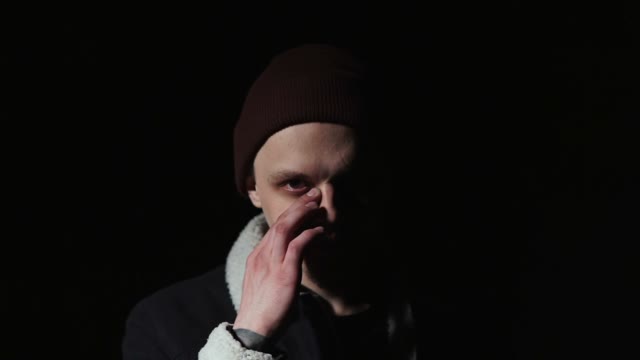 Guy Scratches His Nose And Rea