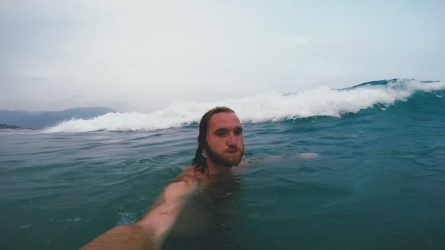 Young Guy Catches Wave