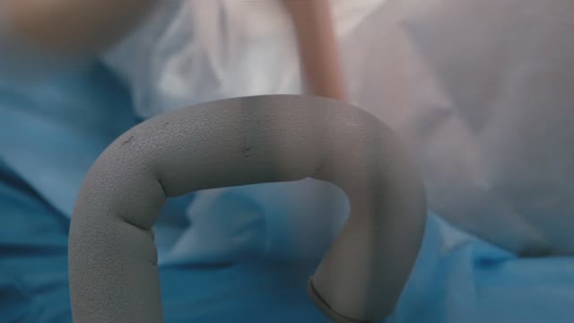 Woman Holds On To The Handrail During Childbirth