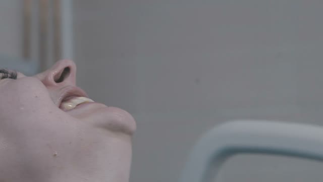Face Of A Woman Giving Birth
