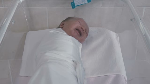 Newborn Baby Opens His Mouth And Screams