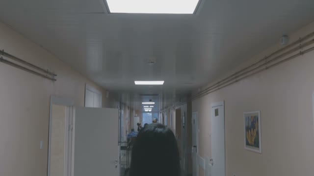 Girl Is Standing In The Corridor Of The Hospital