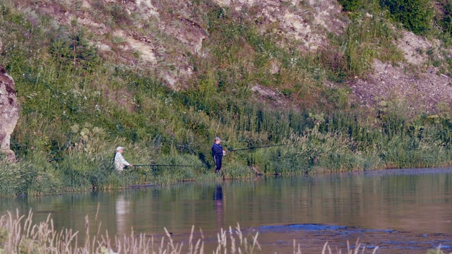 Men Fishing On The Beach